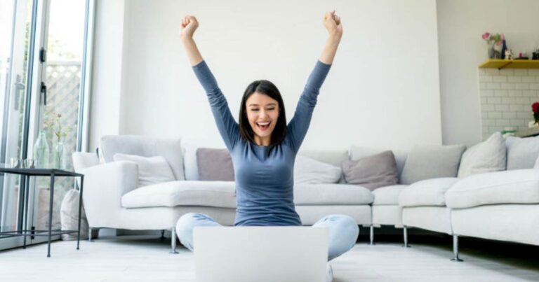 Business owner celebrating a #1 Google ranking