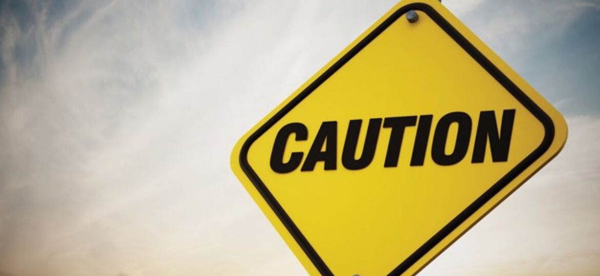 Caution sign warning businesses to avoid mistakes